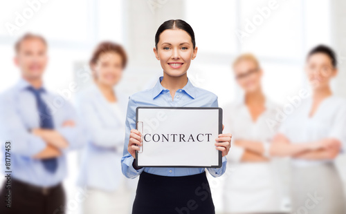 smiling businesswoman with contract