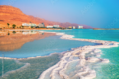 Dead sea salt shore. Ein Bokek, Israel photo
