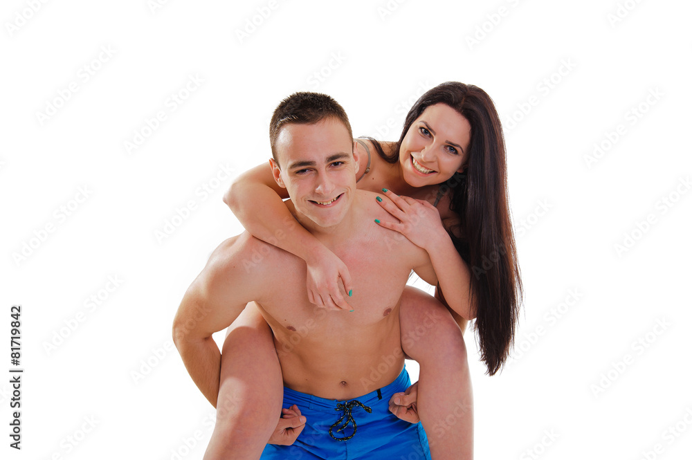 Loving couple in swimwear isolated on white background Loving couple in swimwear isolated on white background