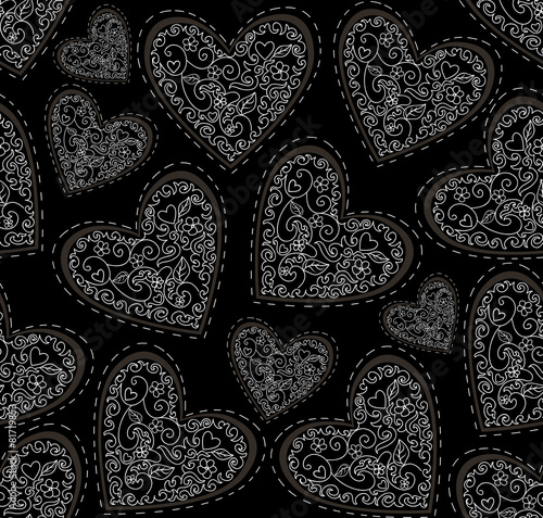 Vector seamless pattern with figured ornamental hearts