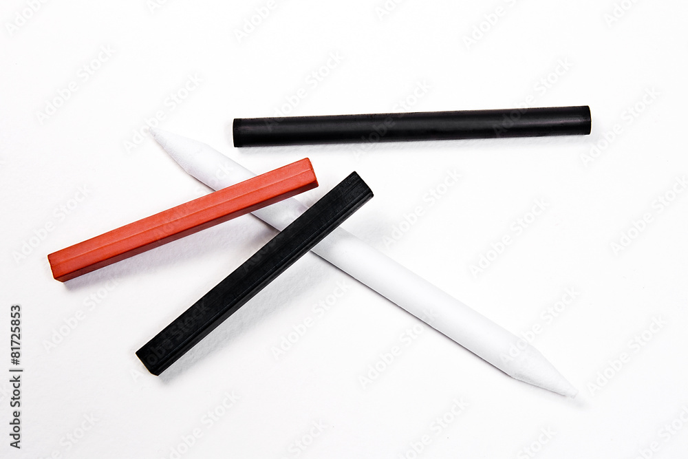 Different kinds of art tools: stamp, chalk of sanguine and charc Different kinds of art tools: stamp, chalk of sanguine and charc