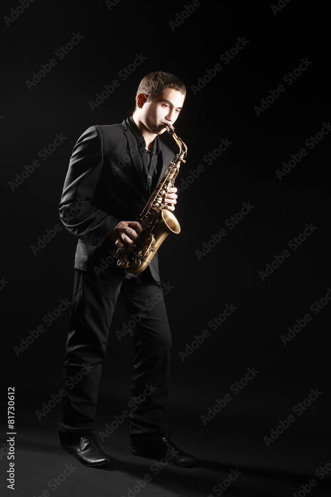Naklejka premium Saxophone player Saxophonist with sax alto