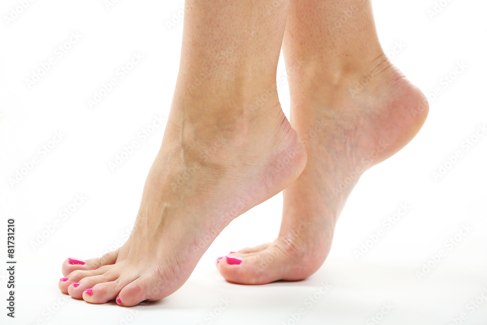 Beautiful female legs, isolated on white background Beautiful female legs, isolated on white background