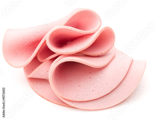 cooked boiled ham sausage or rolled bologna slices isolated on w