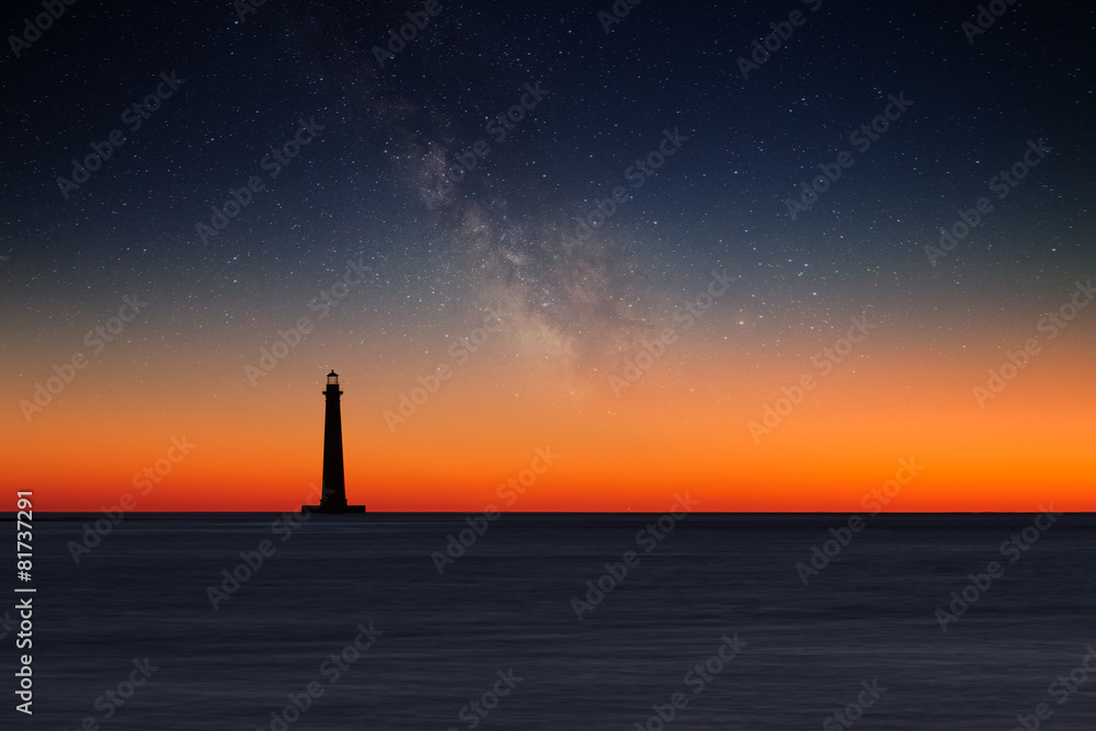 Lighthouse against night sky