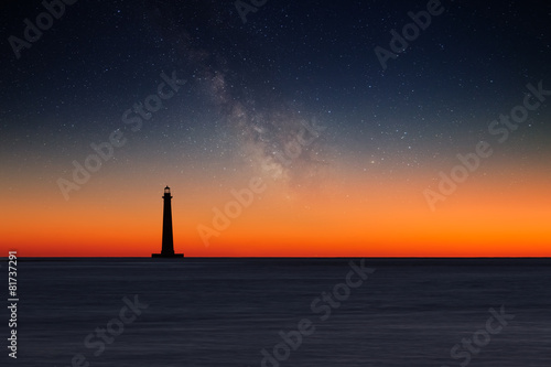 Lighthouse against night sky