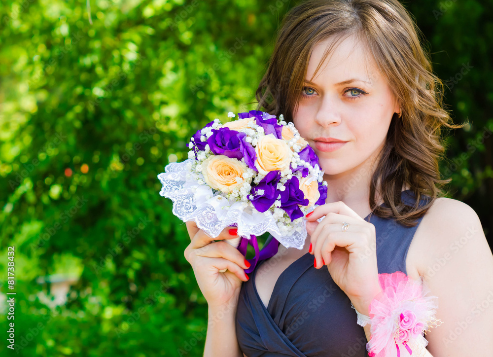 Fototapeta premium Lovely bridesmaid with flower bouquet