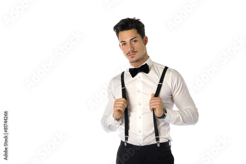 Handsome elegant young man with business suit, suspenders