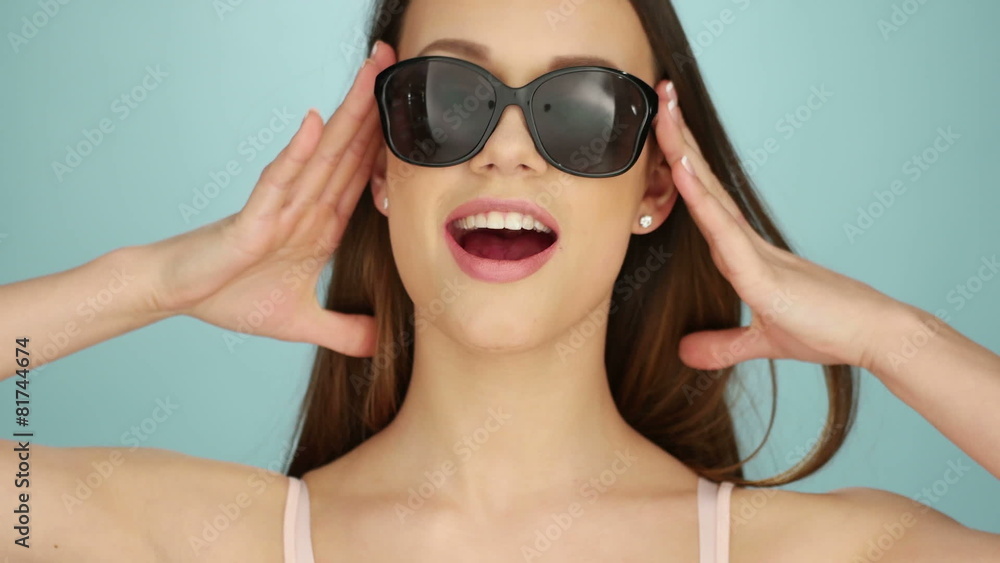 Attractive Young Woman Posing In Sunglasses Attractive Young Woman Posing In Sunglasses