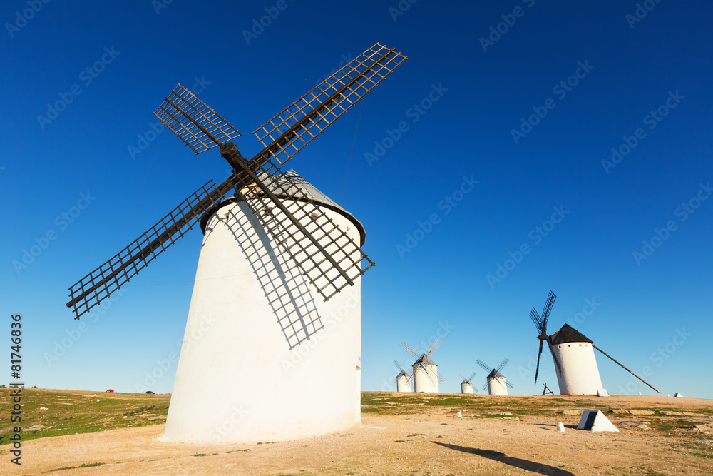 Wide angle shot of group of windmills
