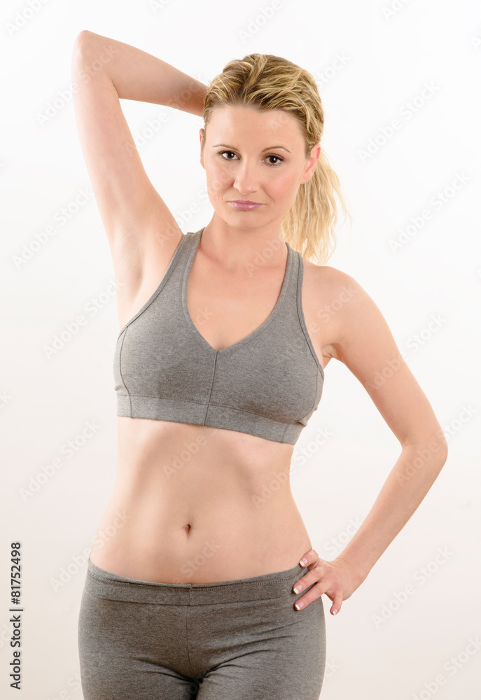 Young woman practicing gymnastics Young woman practicing gymnastics