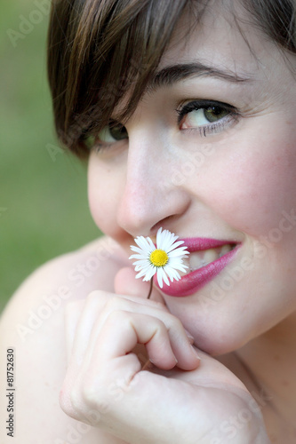 Outdoor portrait of smiling woman