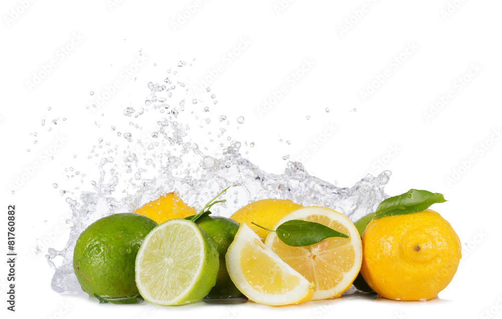 Lemons and limes with water splashes on white Lemons and limes with water splashes on white