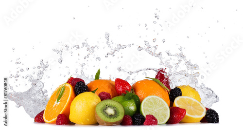 Mix of fruits with water splashes on white