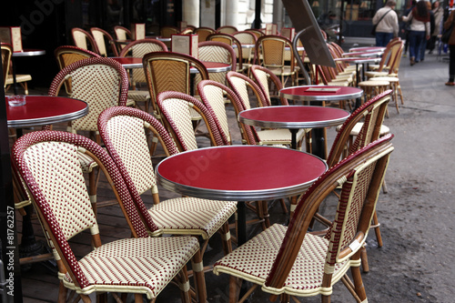 Street view of a coffee terrace with tables and chairs,Paris Fra
