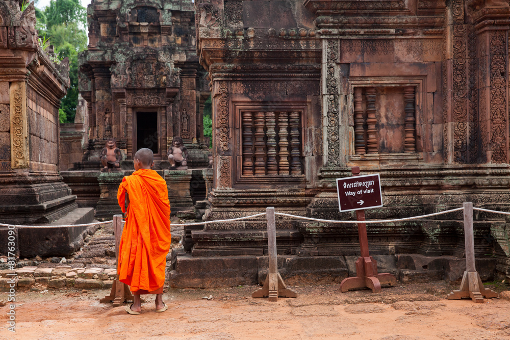 Buddhist monk observing Banteay Srei Temple, Seam Reap