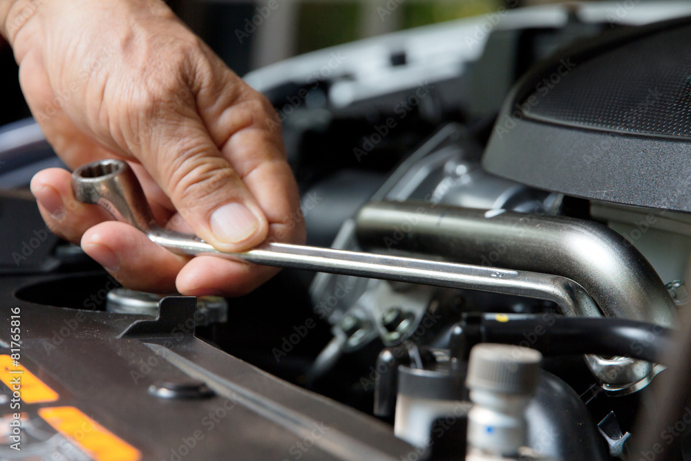 Professional car mechanic, auto repair concept Professional car mechanic, auto repair concept