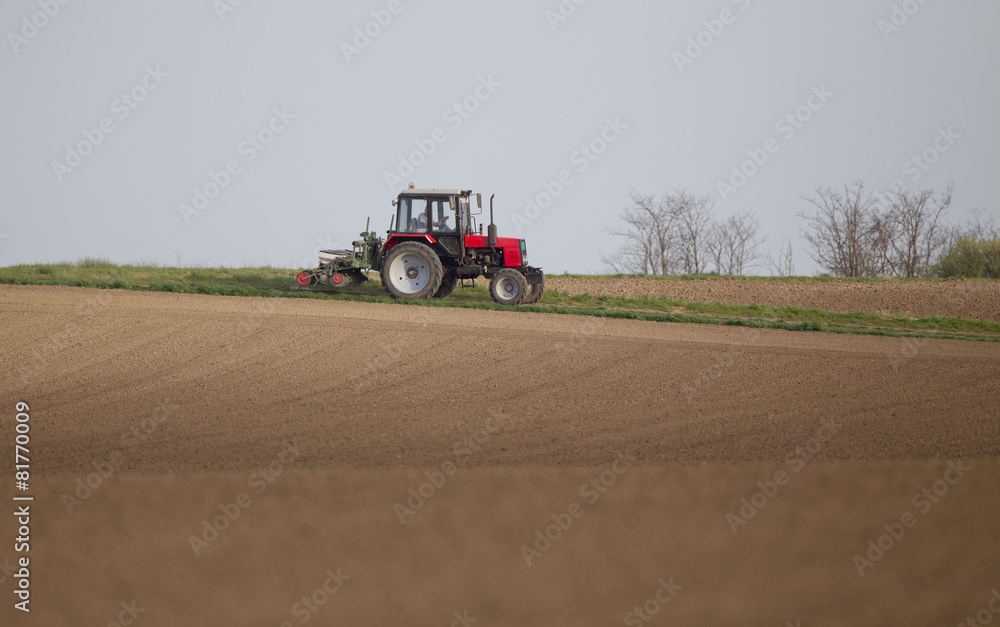 Fototapeta premium Tractor on field
