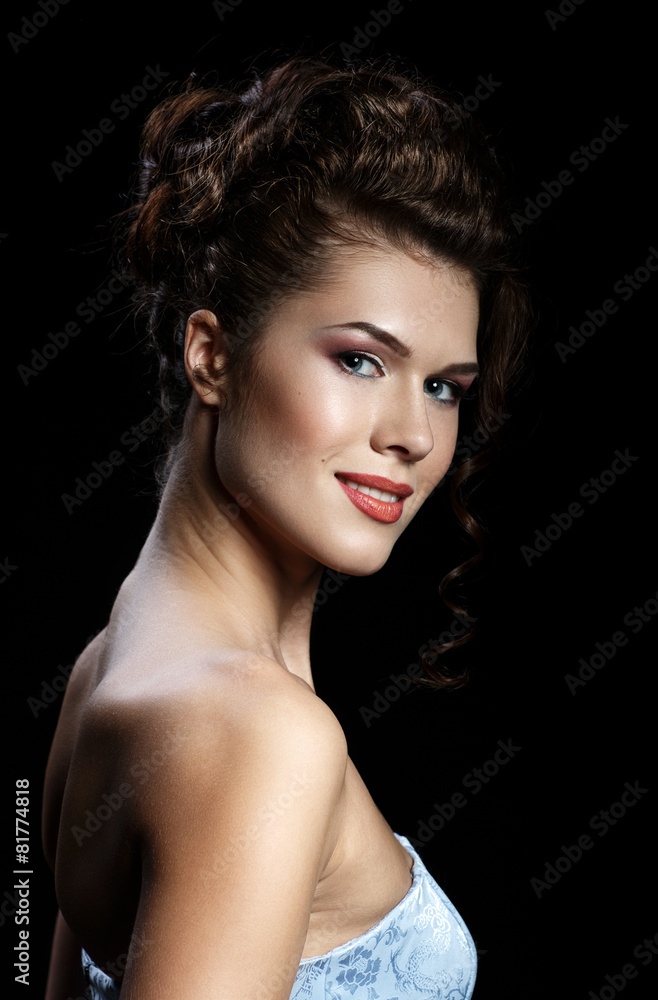 Beautiful brunette woman with evening make-up and hairstyle Beautiful brunette woman with evening make-up and hairstyle