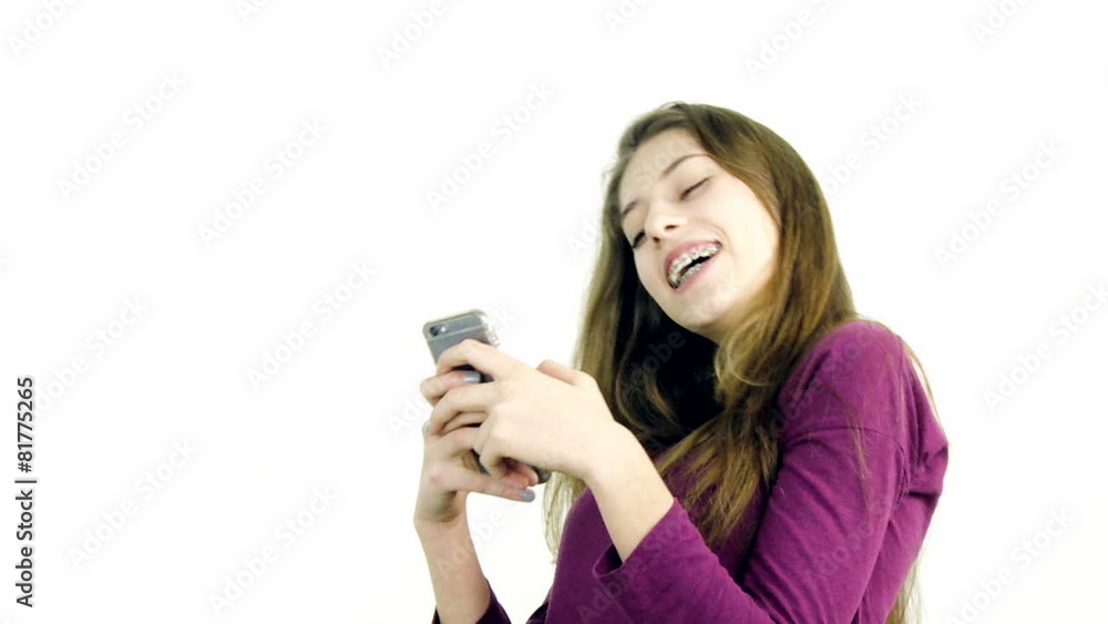 Female teenager playing with cell phone making call Female teenager playing with cell phone making call