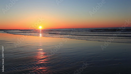 Tranquil beach sunrise