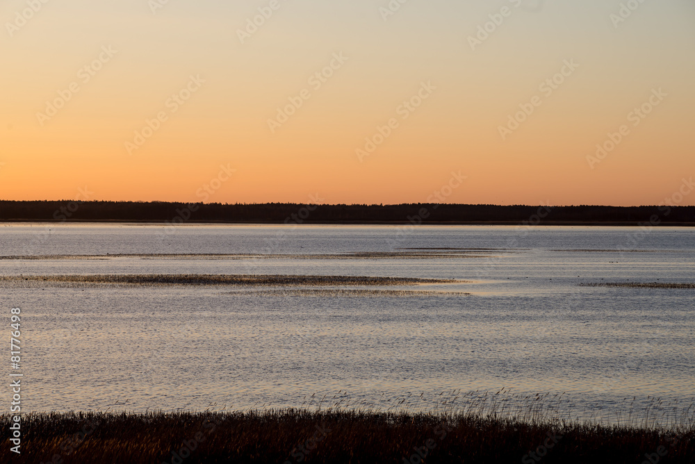 Obraz premium beautiful sunrise over country lake