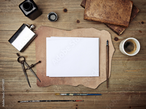 Composition of vintage elements and white blank page