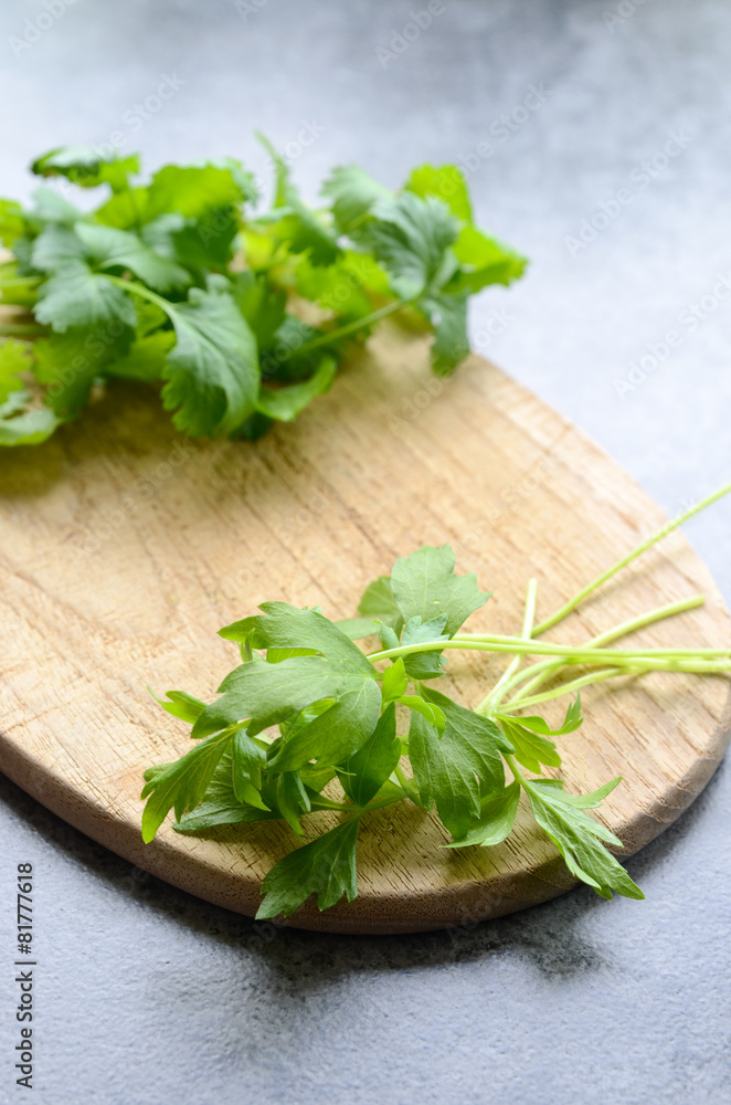 Fresh Lovage on a chopping board Fresh Lovage on a chopping board