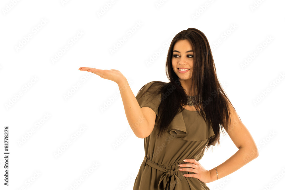 Attractive young woman looking at your product with great joy Attractive young woman looking at your product with great joy