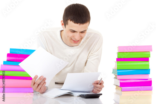 Konstfotografi Young Man Studying. White background. Young man reading a books