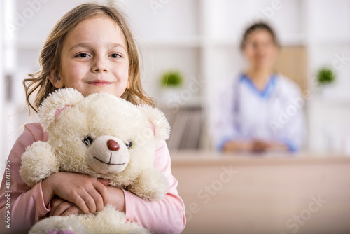 Little girl in a doctor photo