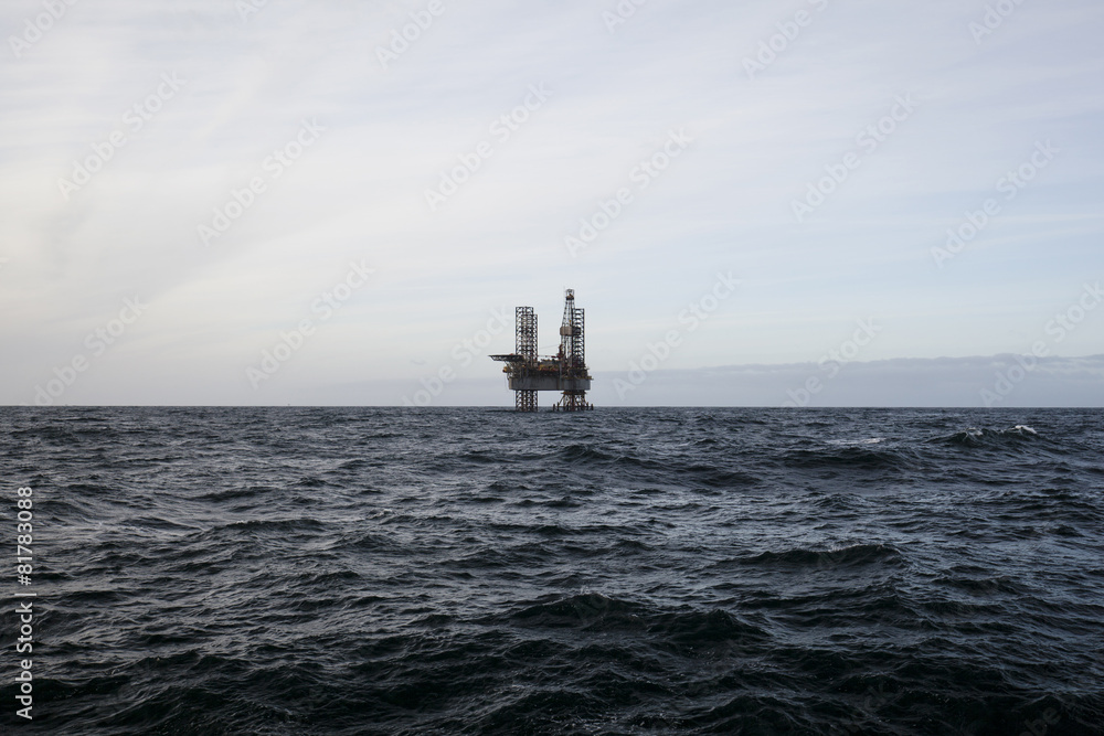 Oil platform on the North Sea while cloudy day