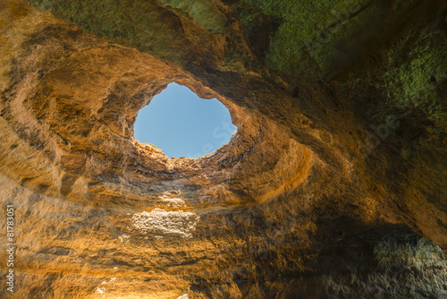 Inside the cave on the coast of the Algarve in Portugal.