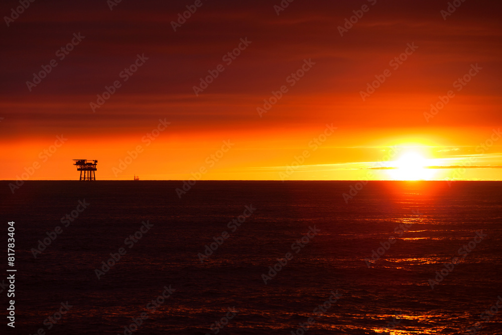Oil platform on the North Sea at sunset