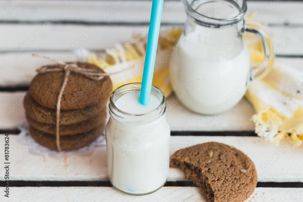 Rustic home made cookies on the wooden background with milk Rustic home made cookies on the wooden background with milk