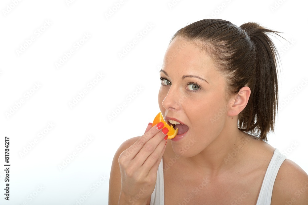 Attractive Young Woman Holding a Plate of Cut Oranges Attractive Young Woman Holding a Plate of Cut Oranges