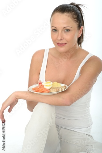 Healthy Young Woman Holding a Typical Norwegian Breakfast