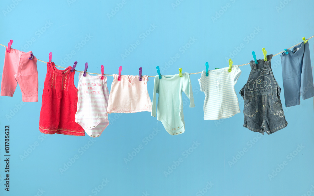 Colorful baby's clothes getting dry Colorful baby's clothes getting dry