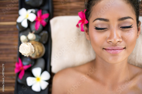 Serene beautiful spa woman relaxing