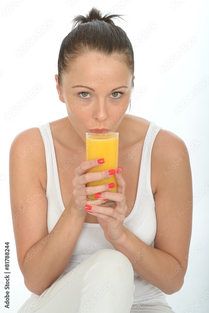 Healthy Happy Fit Young Woman Holding a Glass Of Fresh Orange Ju Healthy Happy Fit Young Woman Holding a Glass Of Fresh Orange Ju