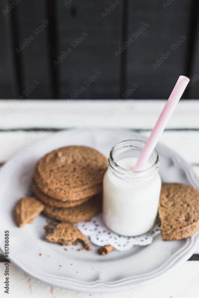 Rustic home made cookies on the wooden background with milk Rustic home made cookies on the wooden background with milk