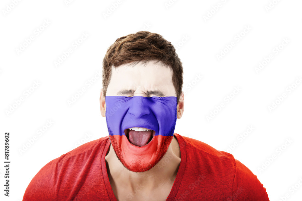 Screaming man with Russia flag on face. Screaming man with Russia flag on face.