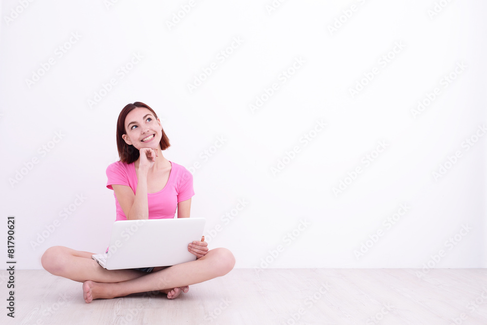 young woman using laptop
