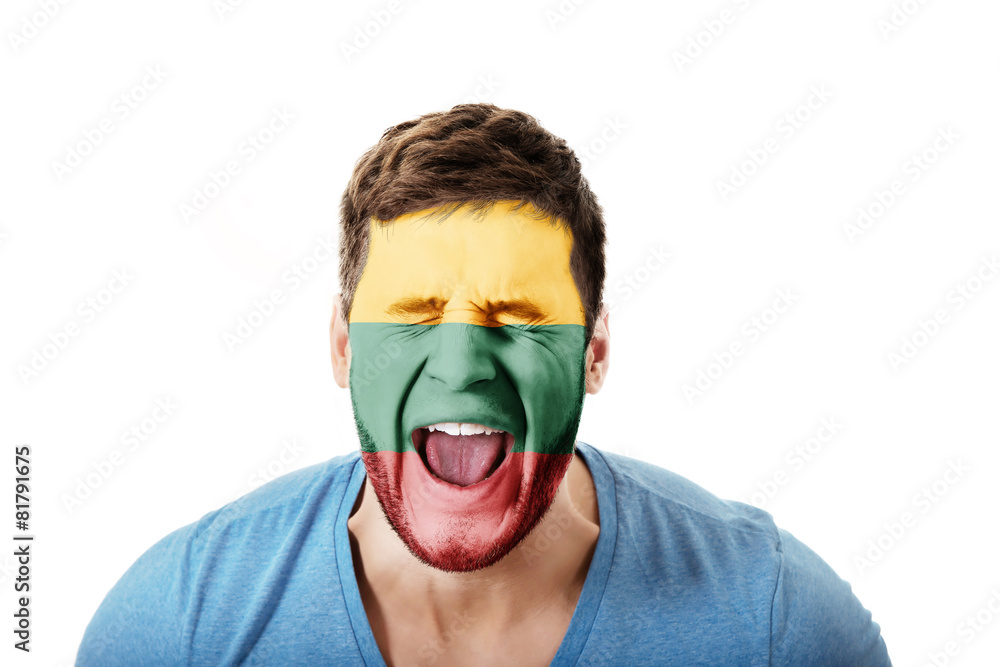 Screaming man with Lithuania flag on face. Screaming man with Lithuania flag on face.