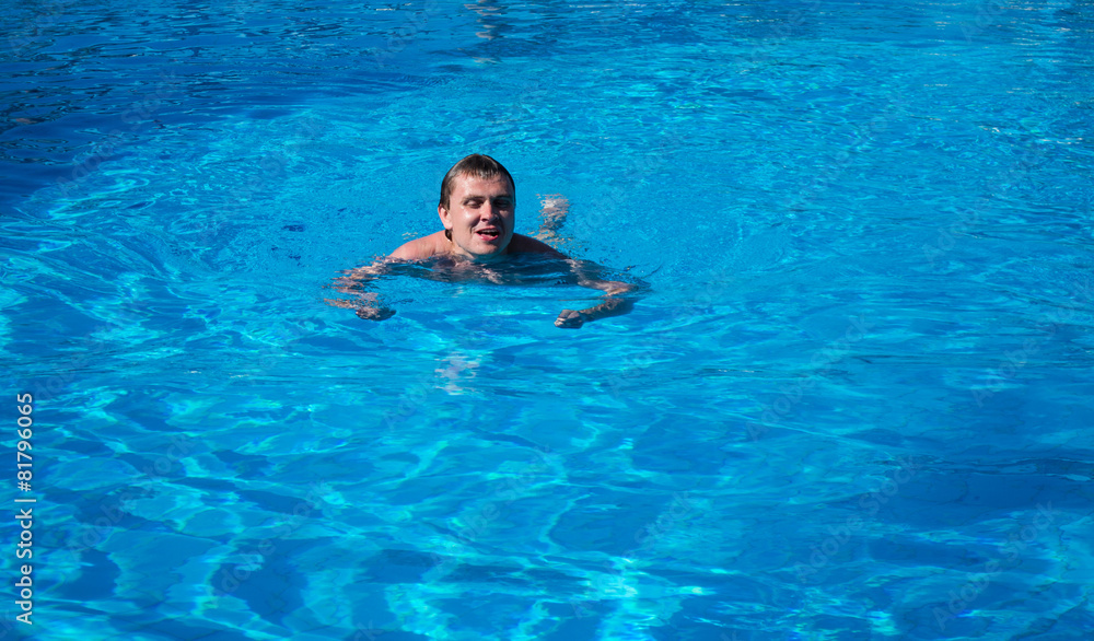 man swim in the pool