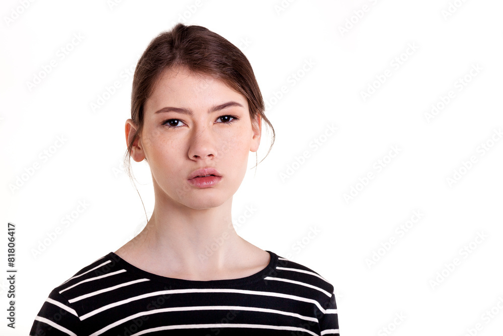 Pretty young teenager girl looking at camera innocently Pretty young teenager girl looking at camera innocently