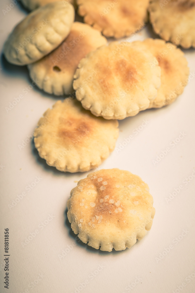 Traditional oyster crackers scattered Traditional oyster crackers scattered