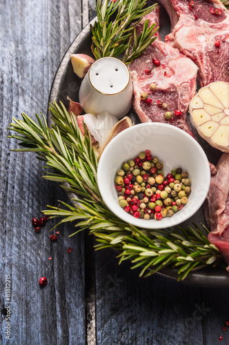 Fototapeta Naklejka Na Ścianę i Meble -  Raw lamb meat with peppercorn, herbs and spices