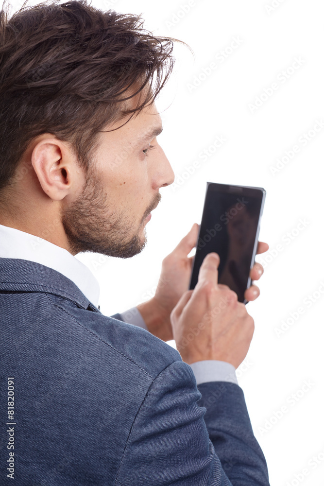 Young businessman talking on mobile isolated on white background Young businessman talking on mobile isolated on white background