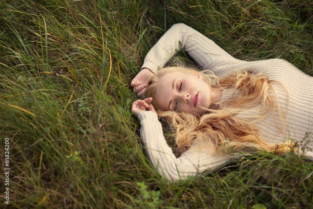 Beautiful Young Girl Lying On The Grass Dreaming Stock Photo 